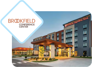 a woman with her arms raised and her eyes closed